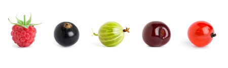 Sweet berries on white . Raspberry, blackcurrant, gooseberry, cherry and redcurrant closeupの写真素材