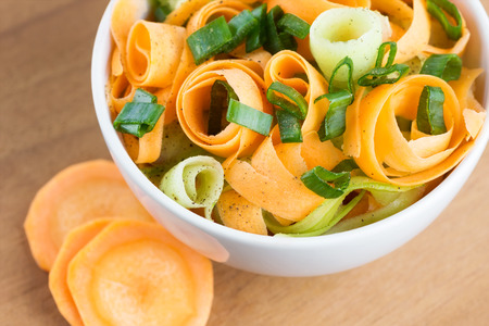 Fresh carrot salad in bowl closeupの写真素材