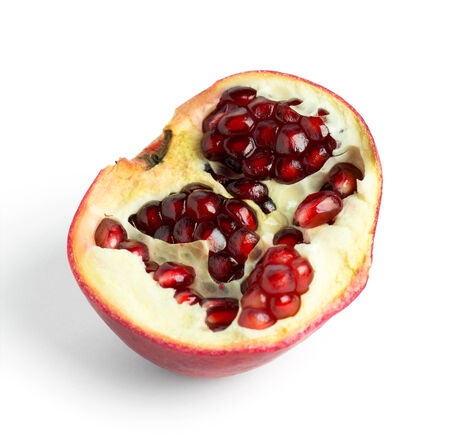 Fresh pomegranate on white backgroundの写真素材