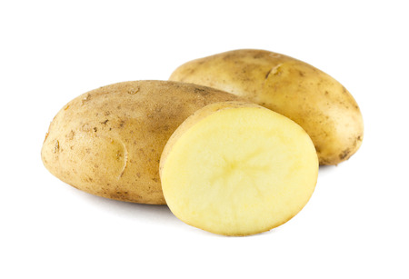 Fresh potatoes on white backgroundの写真素材