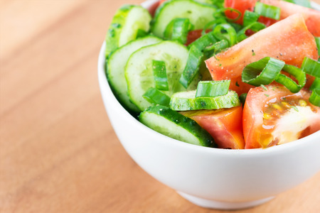 Fresh vegetable salad in bowl closeupの写真素材