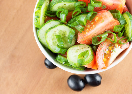 Fresh vegetable salad in bowl closeupの写真素材