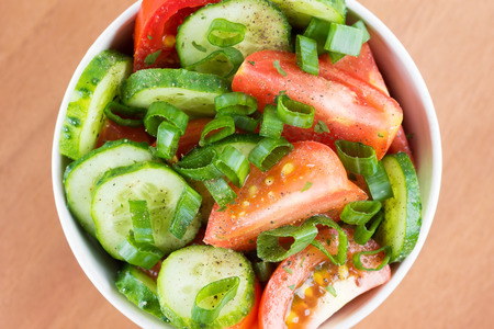 Fresh vegetable salad in bowl closeupの写真素材