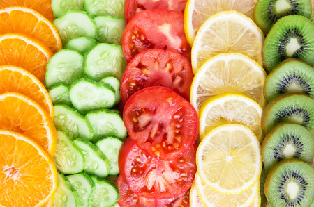 Collection of fruits and vegetables slices. Healthy food backgroundの写真素材