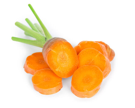 Fresh carrot slices on white backgroundの写真素材