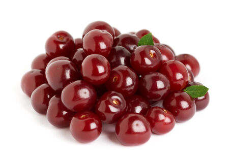Ripe cherries with leaf on white backgroundの写真素材