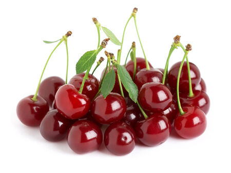 Ripe cherries with leaf on white backgroundの写真素材