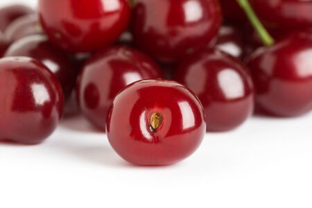 Ripe cherries on white backgroundの写真素材