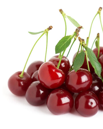 Ripe cherries with leaf on white backgroundの写真素材