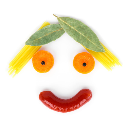 Healthy food concept. A friendly man made of different eating on white backgroundの写真素材