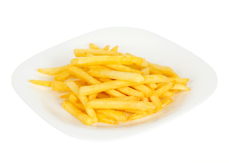 Pile of french fries in plate on white backgroundの写真素材