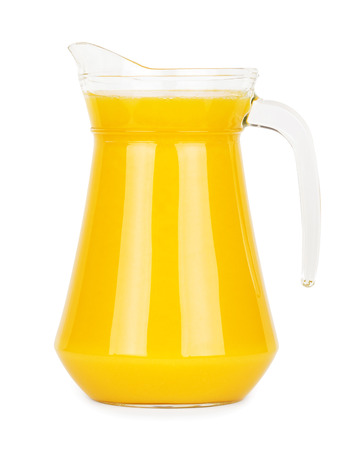 Fresh orange juice in pitcher on white backgroundの写真素材