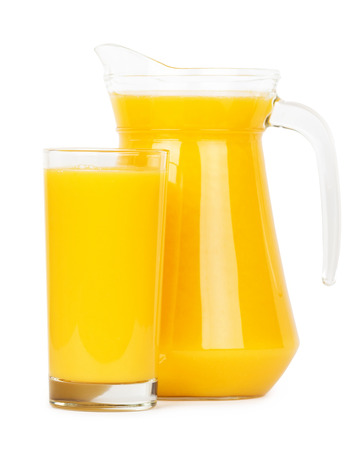 Fresh orange juice in pitcher on white backgroundの写真素材