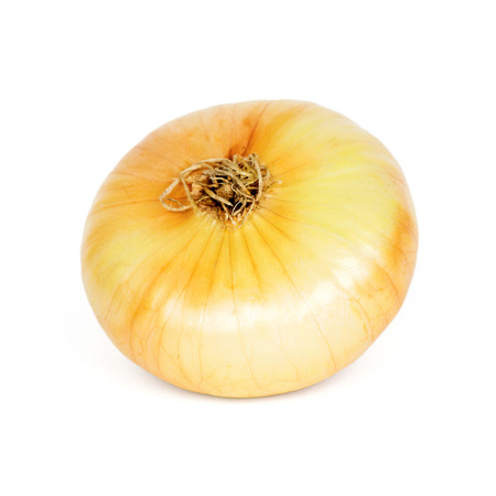 Ripe onions on a white background の写真素材