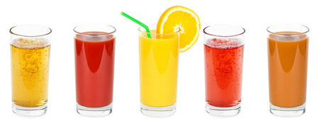 Fresh fruit and vegetable juices in glassの写真素材