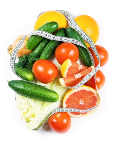 Fresh fruits and vegetables on white background. Diet conceptの写真素材