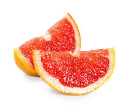 Fresh grapefruit slices on white backgroundの写真素材