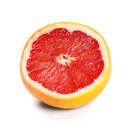 Fresh grapefruit slice on white backgroundの写真素材