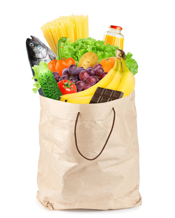 Grocery bag with healthy food on white backgroundの写真素材