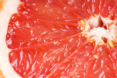 Fresh grapefruit slice closeupの写真素材