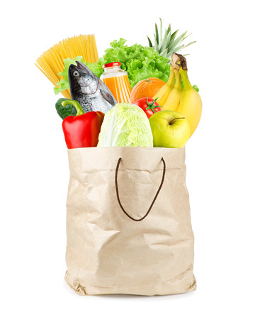 Grocery bag with healthy food on white backgroundの写真素材