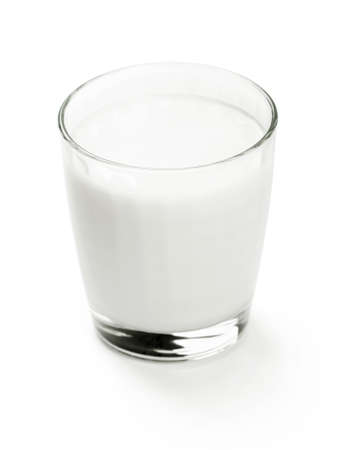 Glass of milk on white backgroundの写真素材