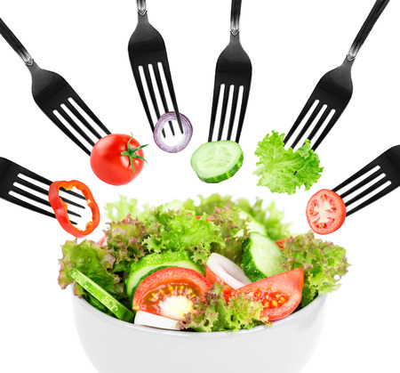 Fresh salad in bowl on white background. Food conceptの写真素材