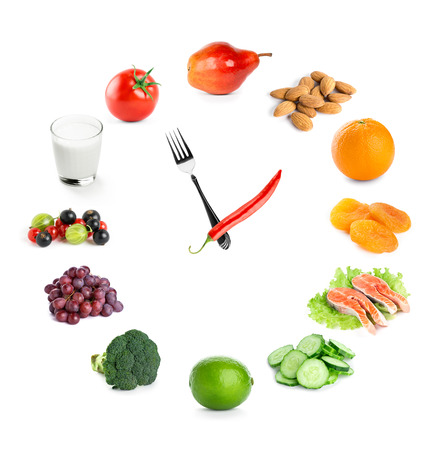 Clock with healthy diet food. Diet conceptの写真素材