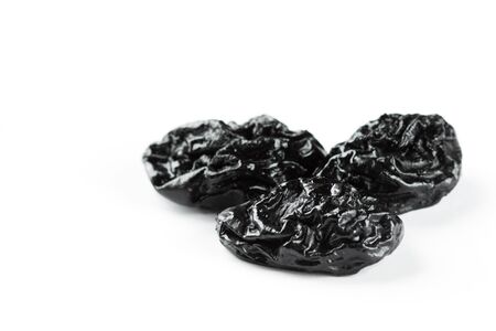 Closeup prunes on white backgroundの写真素材