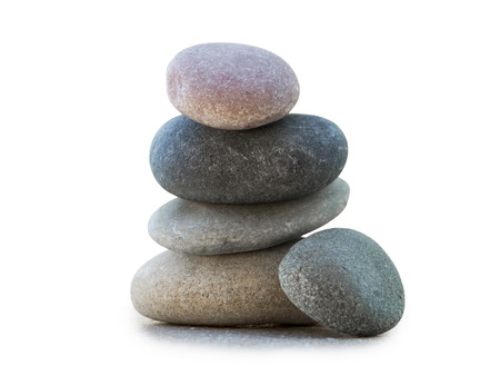 Stack of stones on white background. Concept of balance and harmonyの写真素材
