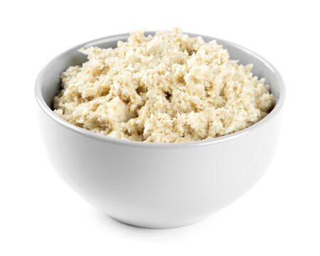 Bowl of porridge on white background. Healthy breakfastの写真素材