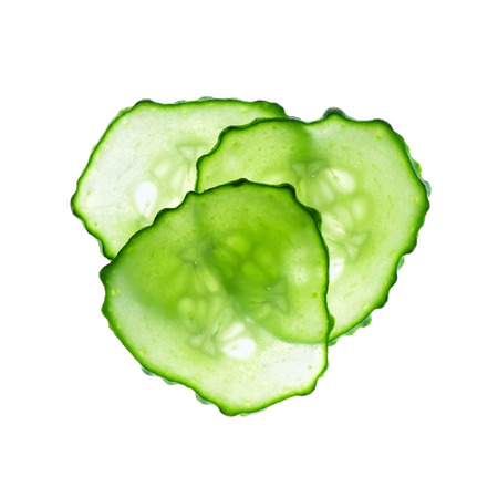 Fresh slices cucumber on white backgroundの写真素材