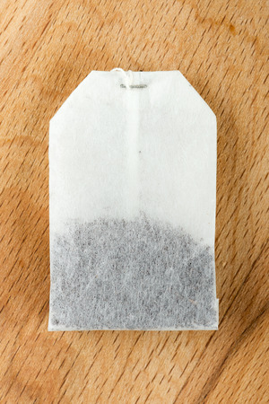 Teabag on wooden backgroundの写真素材