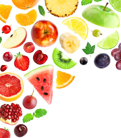 Falling fresh fruits and berries on white backgroundの写真素材