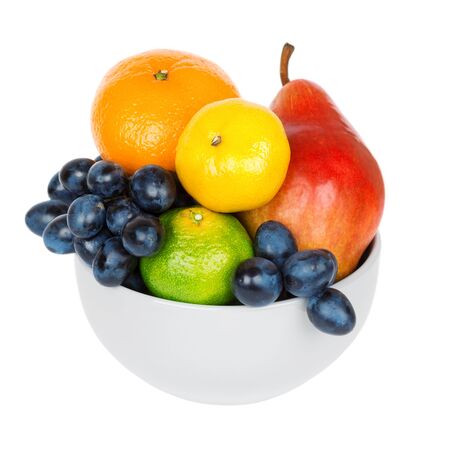 Fresh fruits in bowl on white backgroundの写真素材