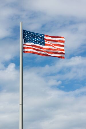 American flag on the blue skyの写真素材