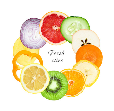 Fresh fruit and vegetable slices on white background. Food conceptの写真素材