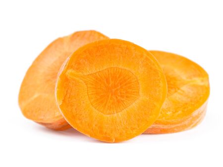 Fresh slice of carrot on white backgroundの写真素材