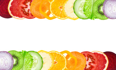Color fruit and vegetable slices on white background. Food conceptの写真素材