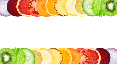 Color fruit and vegetable slices on white background. Food conceptの写真素材