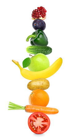 Fruits and vegetables on white background. Healthy food concept. Stack of fresh foodの写真素材