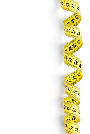 Measuring tape on white background. Diet conceptの写真素材
