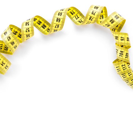 Measuring tape on white background. Diet conceptの写真素材