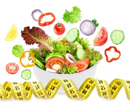 Fresh vegetable salad on white background. Diet concept. Healthy foodの写真素材