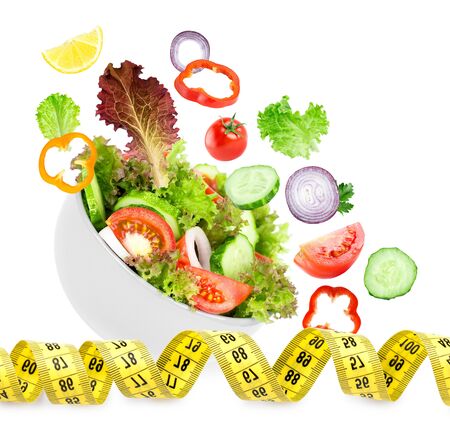 Fresh vegetable salad on white background. Diet concept. Healthy foodの写真素材