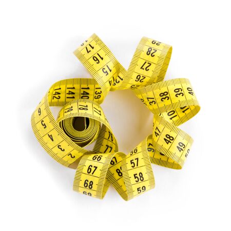 Measuring tape on white background. Diet conceptの写真素材