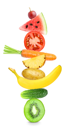 Fruits and vegetables on white background. Healthy food concept. Stack of fresh foodの写真素材
