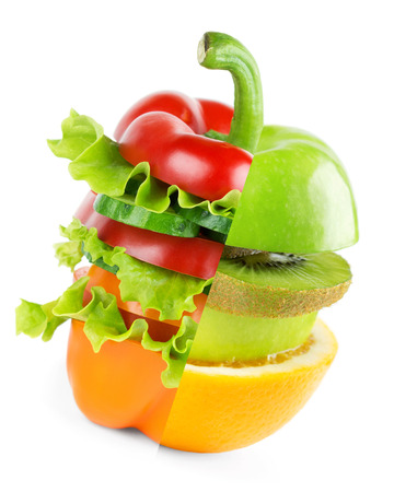 Stack of mixed fruit and vegetable slices on white background. Food conceptの写真素材