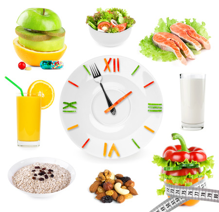 Healthy food. Diet concept. Food clockの写真素材