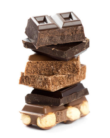 Stack of chocolate on white background. Mixed chocolate barの写真素材